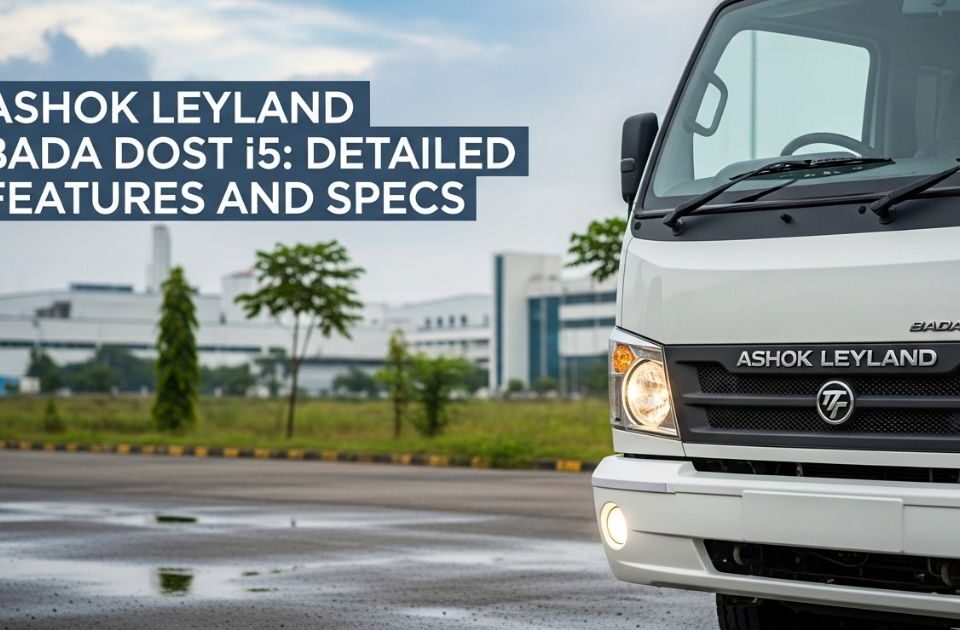 Close-up of Ashok Leyland Bada Dost i5 parked on roadside with factory building in the background