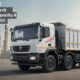 Ashok Leyland 16-Wheeler Truck parked near industrial plant highlighting specs and load capacity