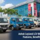 Lineup of Ashok Leyland LCV models parked outside showroom showcasing features and load capacity